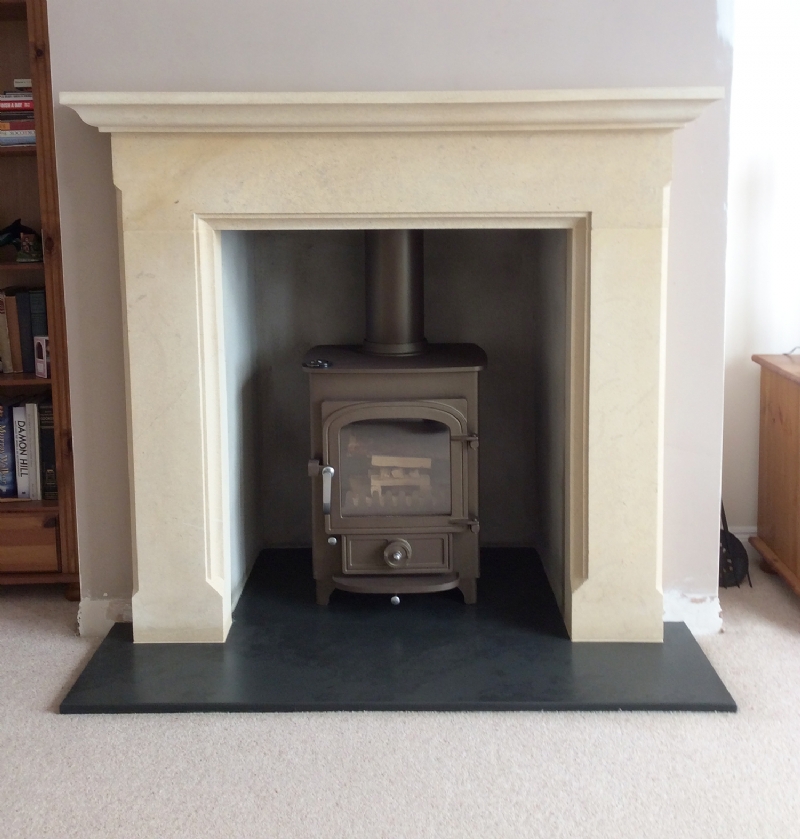 Clearview Pioneer in Brown in a Wessex Stone mantle wood burning stove ...